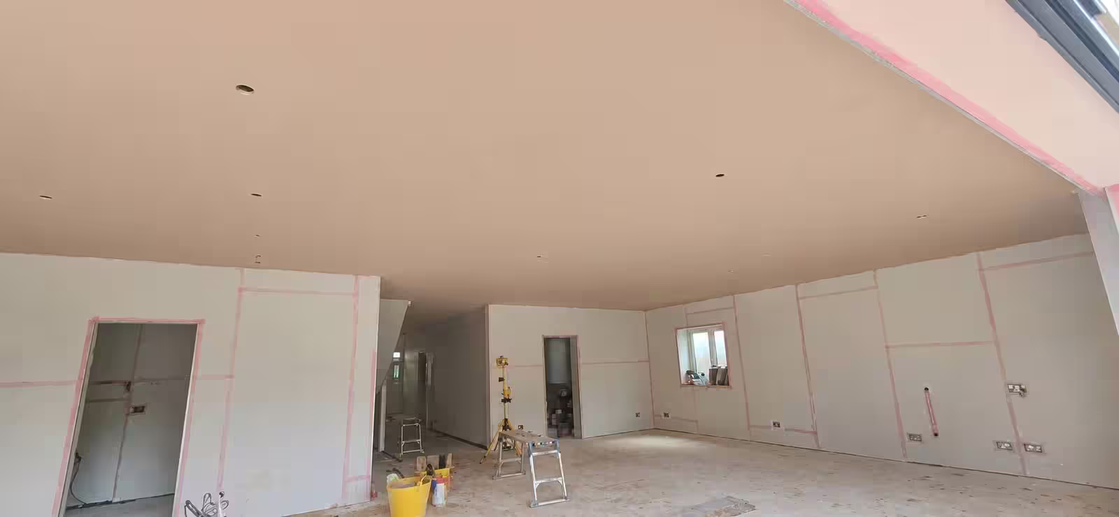 New extension boarded out throughout, joints filled and marked up ready for skimming