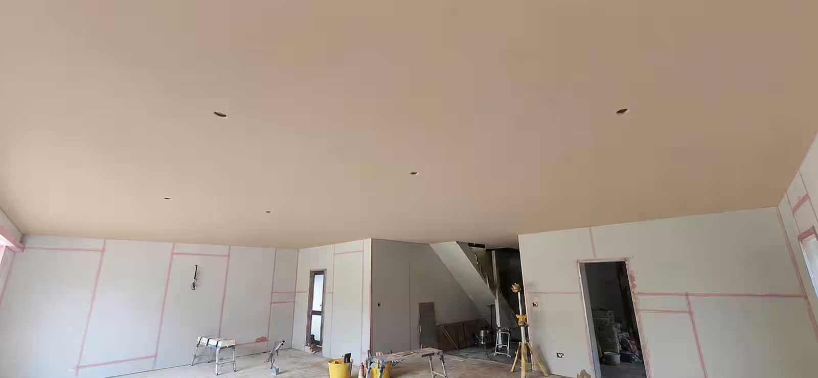 The same extension boarded out, seen from the opposite corner